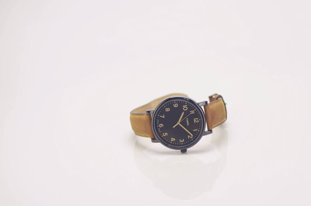 Wristwatch with a brown leather strap